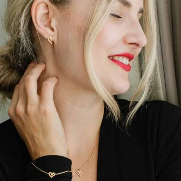 Lumoava Joutsenet Kultakorvakorut L74230800000